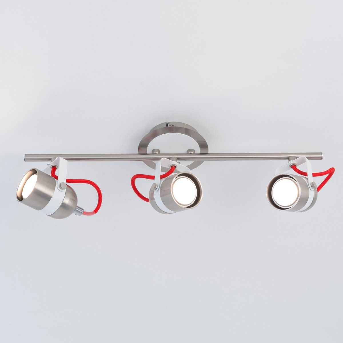Réglette 3 spots orientables PHARO argentée, blanche et rouge en métal
